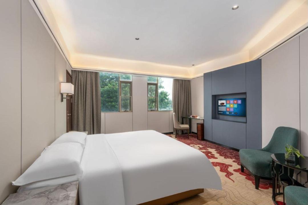 Mizparton Hotel South Qianjin Road Heshan  Exterior photo